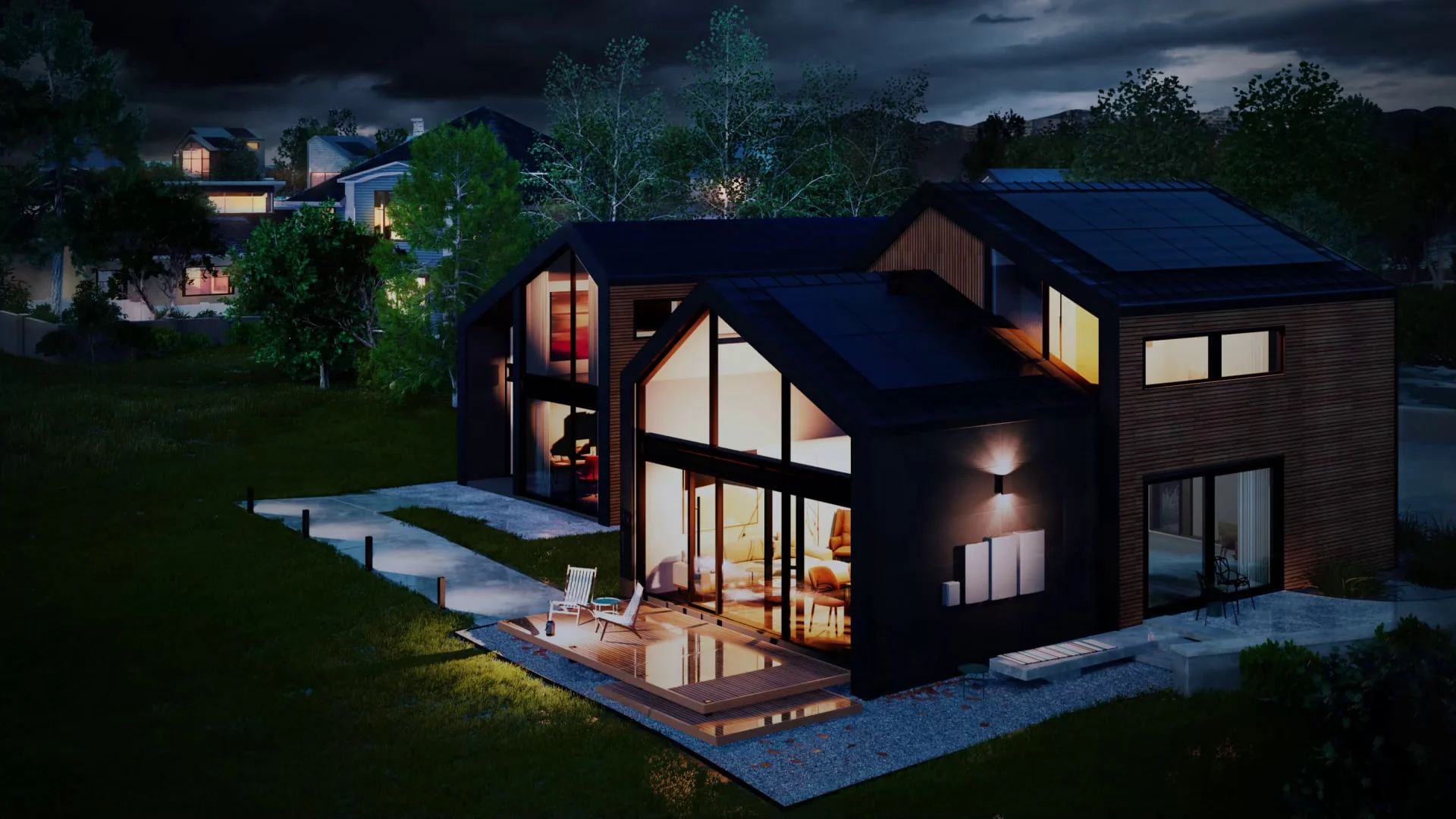 Modern house with large windows illuminated at night, surrounded by trees under a stormy sky